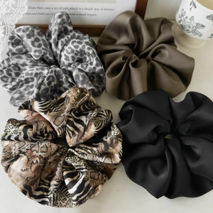 Set of 4 leopard print and solid satin scrunchies for high ponytail hairstyling