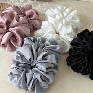 Thick satin scrunchies in pink, white, grey, and black colors with elegant silky gloss