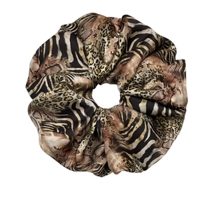Chic leopard and zebra print satin scrunchie with mixed animal patterns for high ponytails