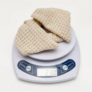 Beige crochet waffle knit hair tie weighing 23.0g on a digital scale for quality