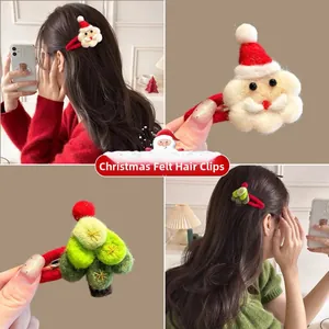 Detail showing wool felt Santa and Christmas tree hair clips with red metal ducks clips