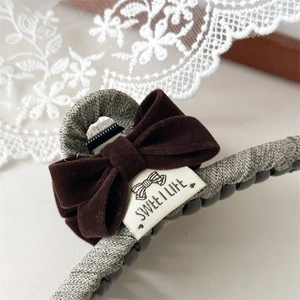 Vintage velvet bow hair claw clip with Sweet Life label for elegant French hairstyles