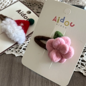 Handmade wool felt Santa hat and pink flower hair clips for girls on a gift card
