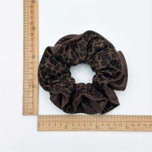 Vintage double-layered leopard print velvet scrunchie, 13cm diameter on white background