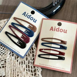 Set of 4 matte teardrop snap hair clips in dark brown, navy, wine red, and black