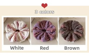 Detail of three knitted striped scrunchies in white, red, and coffee autumn colors