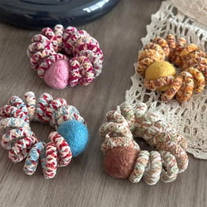 Colorful woven telephone wire hair ties with wool pom-poms for durable elastic styling
