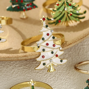 Golden Christmas tree napkin ring with white enamel and colorful rhinestones for table decor