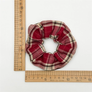 Classic red plaid fabric scrunchie with 11cm diameter shown on pure white background