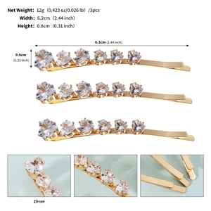 Detailed view of three gold zircon heart hair pins with 6.2cm length and 12g weight