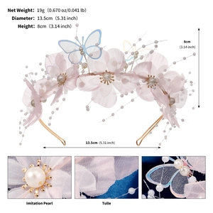 Detail of pink tulle flower headband with imitation pearls and butterfly tassels