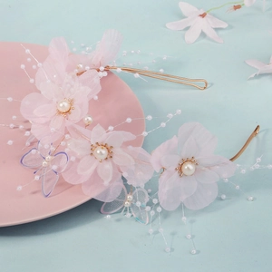 Handmade pink organza flower and pearl headband with purple butterfly charms