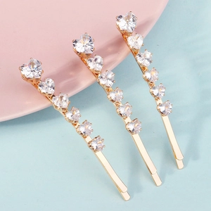 Three-piece gold hair clip set with sparkling heart-shaped zircon rhinestones