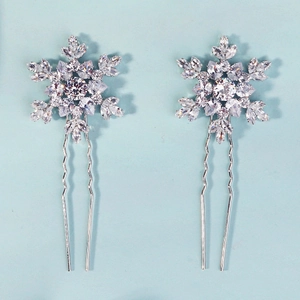 Sparkling silver snowflake hair pins with zircon inlay and U-shaped design for bridal styling