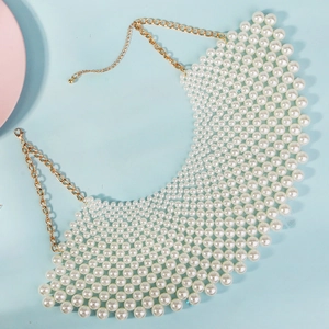 Detail of multi-row mesh pearl collar necklace with adjustable gold chain and lobster clasp