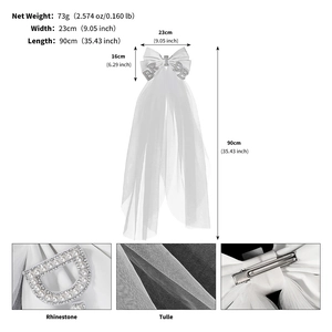 Detailed views of bride veil with white bow, rhinestone letters and metal hair clip
