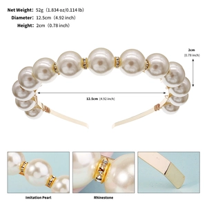 Detailed view of handmade headband with large artificial pearls and rhinestone rings