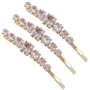 Three-piece set of elegant gold hair clips with sparkling gradient square crystals