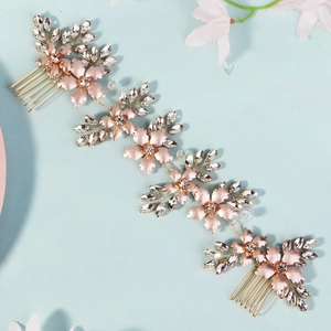 Rose gold bridal hair vine with metal flowers and rhinestones for wedding hairstyle