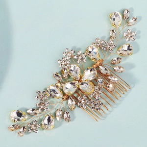 Exquisite bridal hair comb with rhinestone flowers and golden wire mesh on light blue background