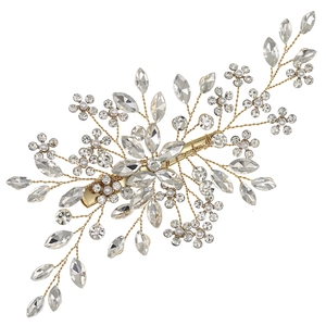 Handmade bridal hair clip with gold wire, sparkling rhinestones and white pearls