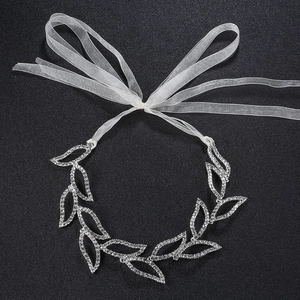Cerchietto da sposa di lusso con foglie di strass e nastro di organza per matrimoni