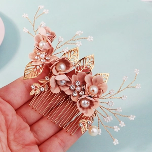 Handmade gold bridal hair comb with pink fabric flowers, pearls and crystal leaf detail