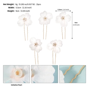 Detailed close-up of 5-piece floral hair pins with white fabric petals and imitation pearls
