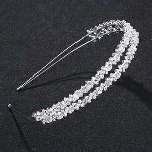 Detailed view of the double-layer silver bridal headband with luxury clear crystals