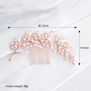 Detail of rose gold bridal hair comb with pearls and rhinestones measuring 12cm by 6cm