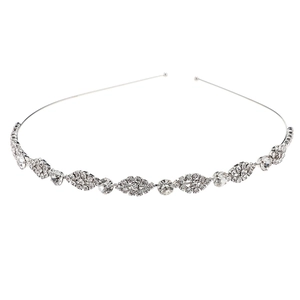 Elegant silver wavy headband with leaf-shaped rhinestones for bridal wedding hairstyles