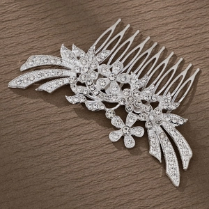 Silver bridal hair comb with rhinestone flowers and leaves for wedding hairstyles