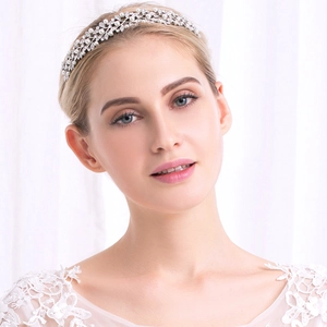 Elegant bridal headband with pearls and rhinestones on silver vine metal frame for weddings
