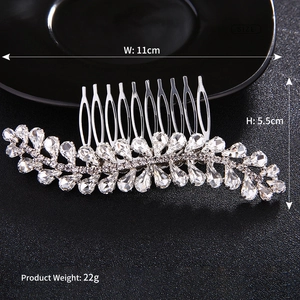 Elegant bridal hair comb with silver rhinestones and leaf-shaped crystal motifs