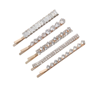 Detailed view of 5-piece gold hair clip set with assorted white rhinestones