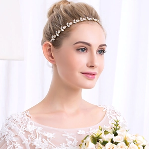 Elegant bridal headband featuring sunflower rhinestones and gold leaf designs for weddings