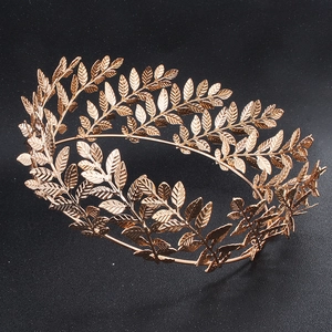 Vintage golden laurel leaf bridal crown with detailed olive branch design for weddings