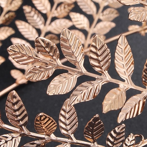 Exquisite golden olive leaf bridal crown with detailed leaf texture and metallic finish