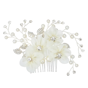Elegant bridal hair comb featuring silk flowers, white pearls and sparkling leaf rhinestones