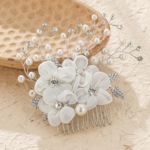 Elegant bridal hair comb with white fabric flowers, pearls and rhinestones on silver comb