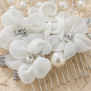 Elegant white fabric flower bridal hair comb with pearls, crystals and silver leaves