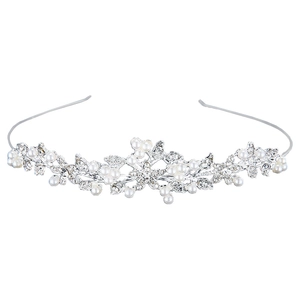 Exquisite bridal crown with white pearls and sparkling rhinestones on silver metal headband