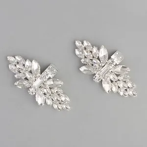 Detailed close-up of bridal rhinestone shoe clips with sparkling crystal marquise stones
