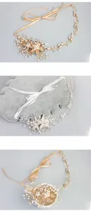 Detail of bridal headband with gold floral wire, white pearls and sparkling rhinestones