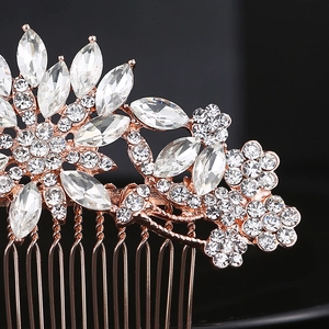 Detailed macro view of rose gold floral hair comb with sparkling crystal rhinestones