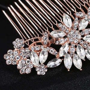 Exquisite rose gold floral bridal hair comb with brilliant rhinestone and leaf details