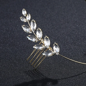 Elegant gold olive leaf hair comb with marquise-cut rhinestones for bridal hairstyle