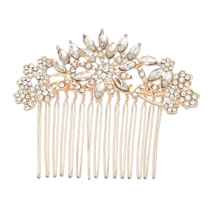 Elegant bridal hair comb featuring crystal flowers and gold alloy leaves on white background