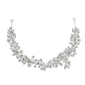 Exquisite bridal headband with white flowers, crystals and pearls in vine design