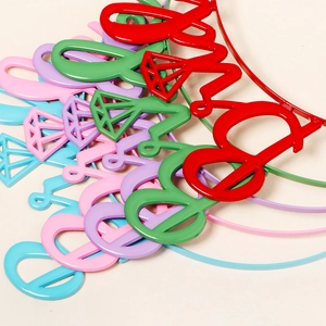 Close-up of colorful Bride alloy headbands with diamond icon for wedding parties